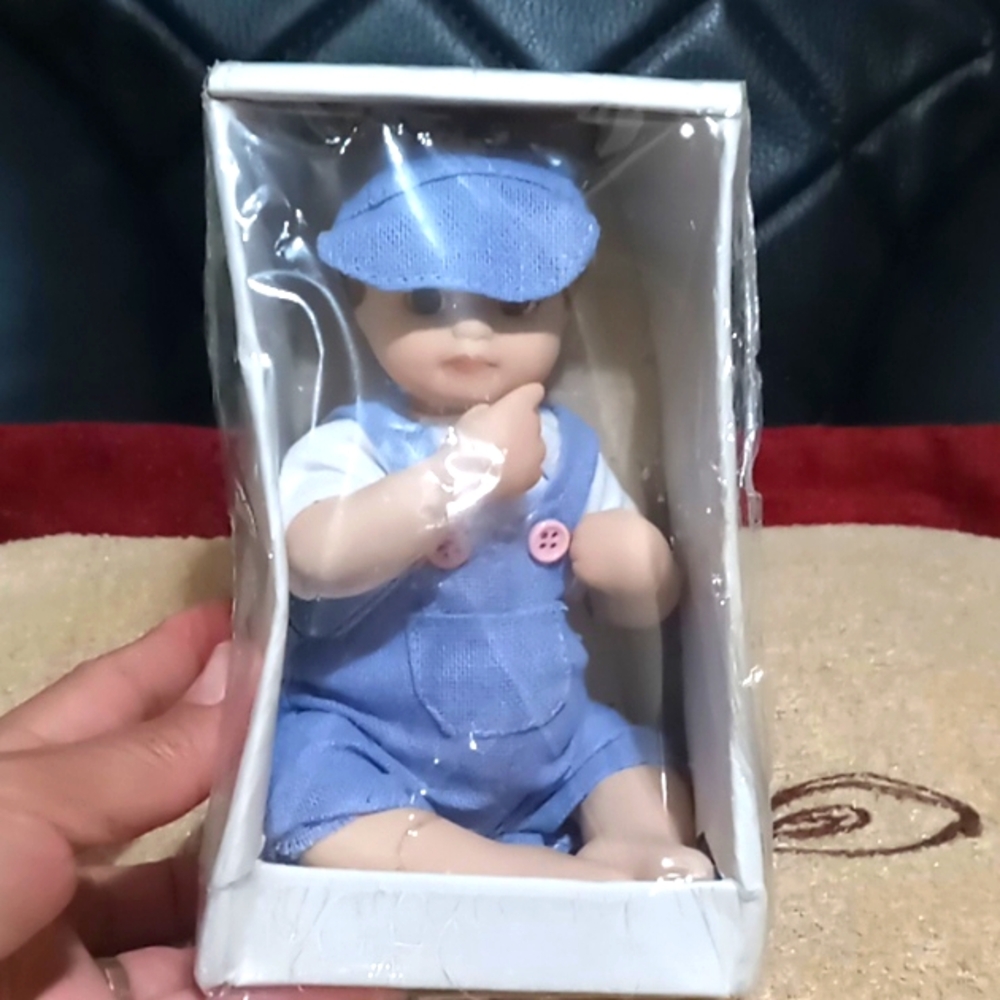 VINTAGE PORCELAIN DOLL